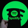 Spotify logo on a phone@2000x1500 1068x801