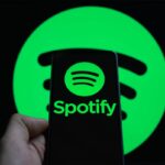 Spotify logo on a phone@2000x1500 1068x801