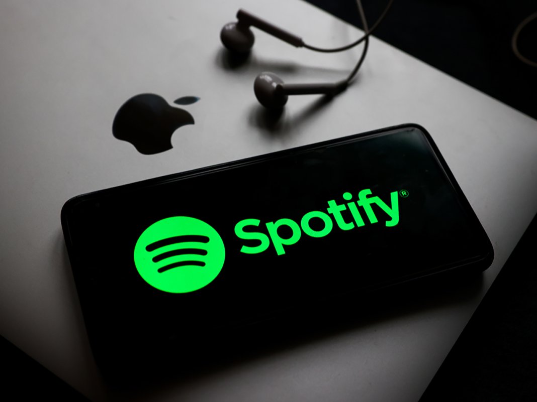 Spotify logo phone Macbook credit Beata Zawrzel NurPhoto Getty Images@1400x1050